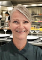 Chef Kellie, a private chef in Fort Myers, smiling warmly